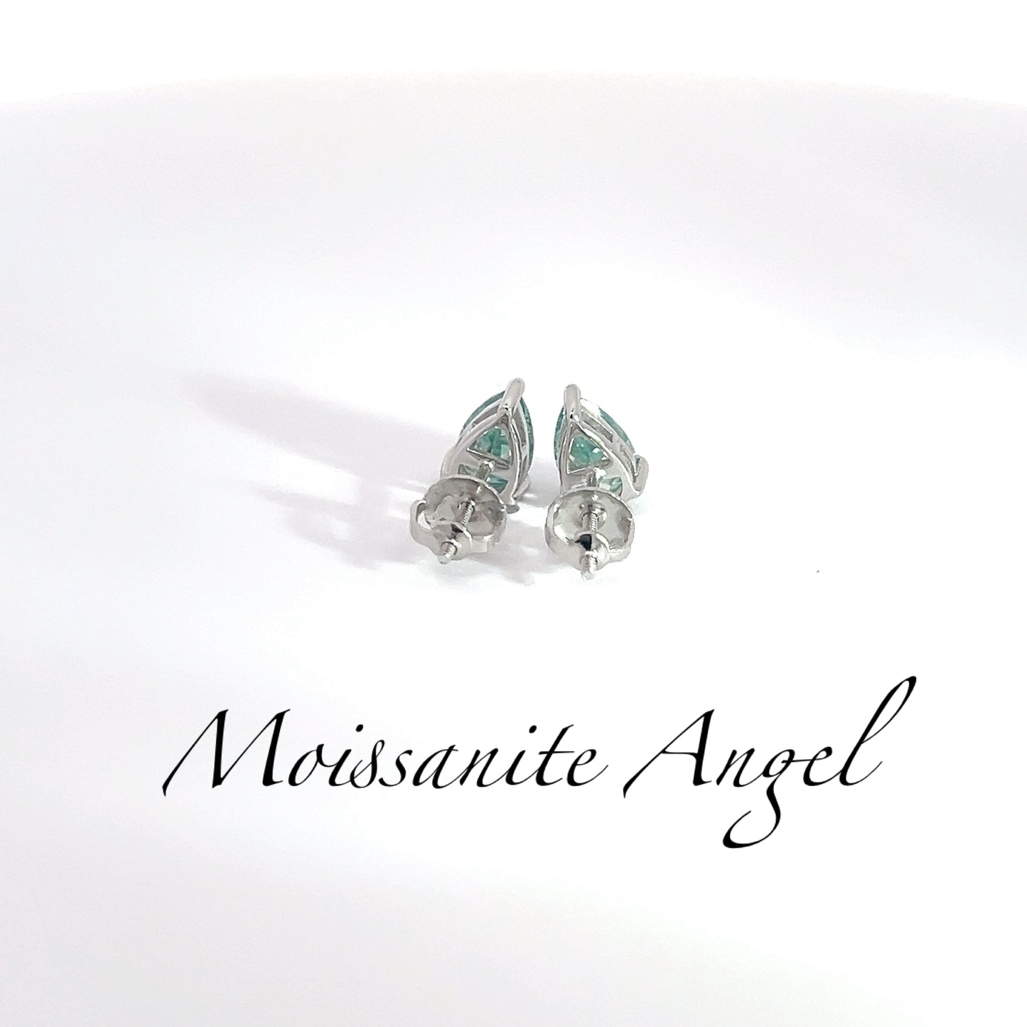 Moissanite green pear shaped earrings