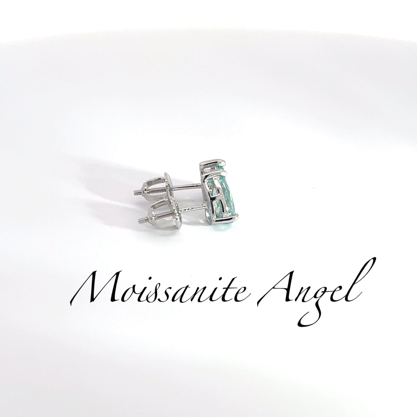 Moissanite green pear shaped earrings