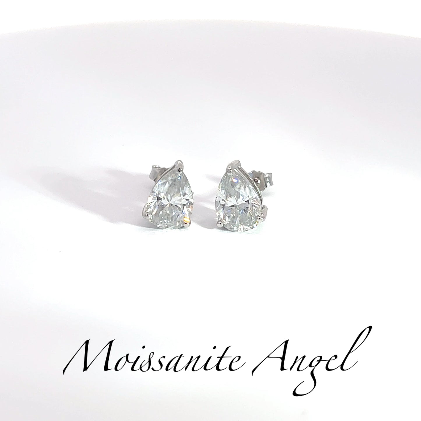 Gorgeous 4 Carat total weight Moissanite Pear Shape Stud Earrings