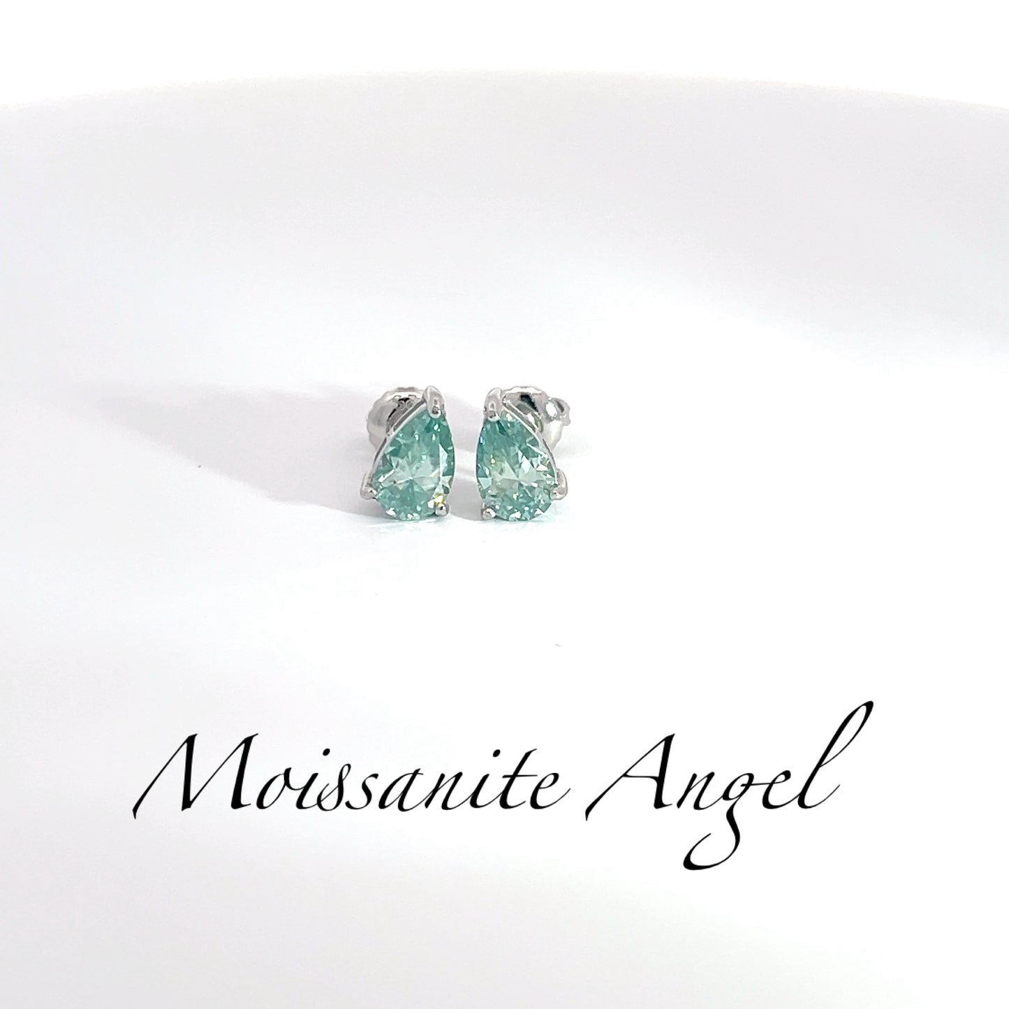 Moissanite green pear shaped earrings